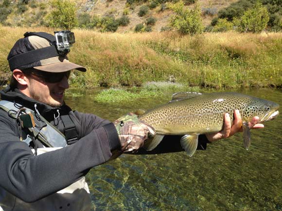 Another beautiful trout landed with New Zealand bi-lingual fishing guide Alan Campbell