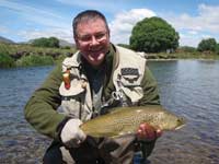The smile says it all! Jon with a plump Mackenzie Country brownie.