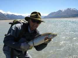 Pat with a solid brown trout in beautiful New Zealand