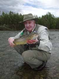 Allan with his river trout.