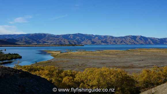 Autumn over Lake Benmore with New Zealand bi-lingual fishing guide Alan Campbell