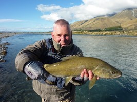 Fly fishing trout in beautiful New Zealand