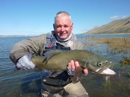 Fly fishing trout in beautiful New Zealand