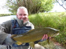 Fly fishing trout in beautiful New Zealand