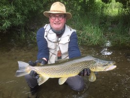 Fly fishing trout in beautiful New Zealand