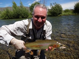 Fly fishing trout in beautiful New Zealand