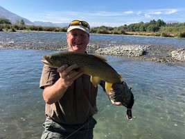 Fly fishing trout in beautiful New Zealand