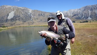 Fly fishing trout in beautiful New Zealand