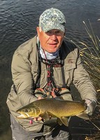 Fly fishing trout in beautiful New Zealand