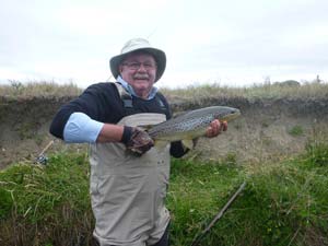 Fly fishing trout in beautiful New Zealand
