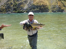 Fly fishing trout in beautiful New Zealand