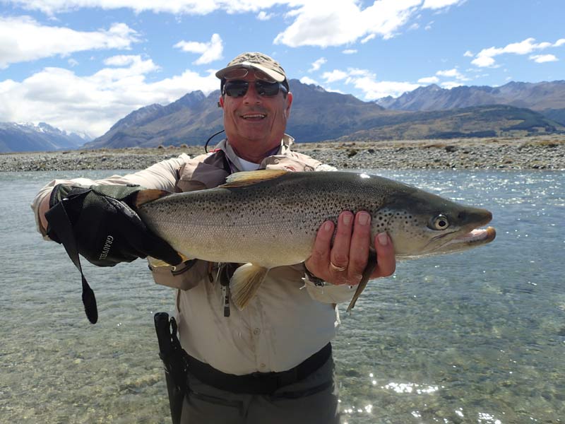 Fly fishing trout in beautiful New Zealand