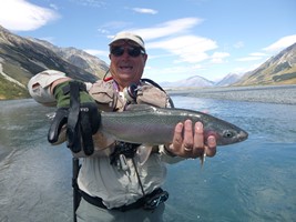 Fly fishing trout in beautiful New Zealand