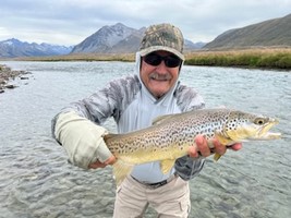 Fly fishing trout in beautiful New Zealand