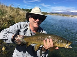 Fly fishing trout in beautiful New Zealand