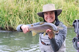 Ladies fly fishing trout in New Zealand