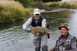 Trout hooked by anglers fly fishing in the lakes and rivers at the foot of the Southern Alps in New Zealand.