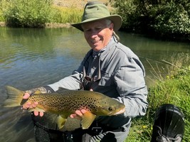 Fly fishing trout in beautiful New Zealand