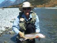 Melanie with her river trout.