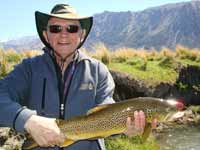 Raymond from Toulouse, France with a brown trout caught in New Zealand.