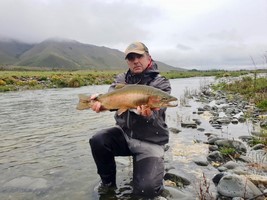 Fly fishing trout in beautiful New Zealand