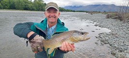 Fly fishing trout in beautiful New Zealand